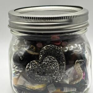 Craft jewelry jar with assorted jewelry